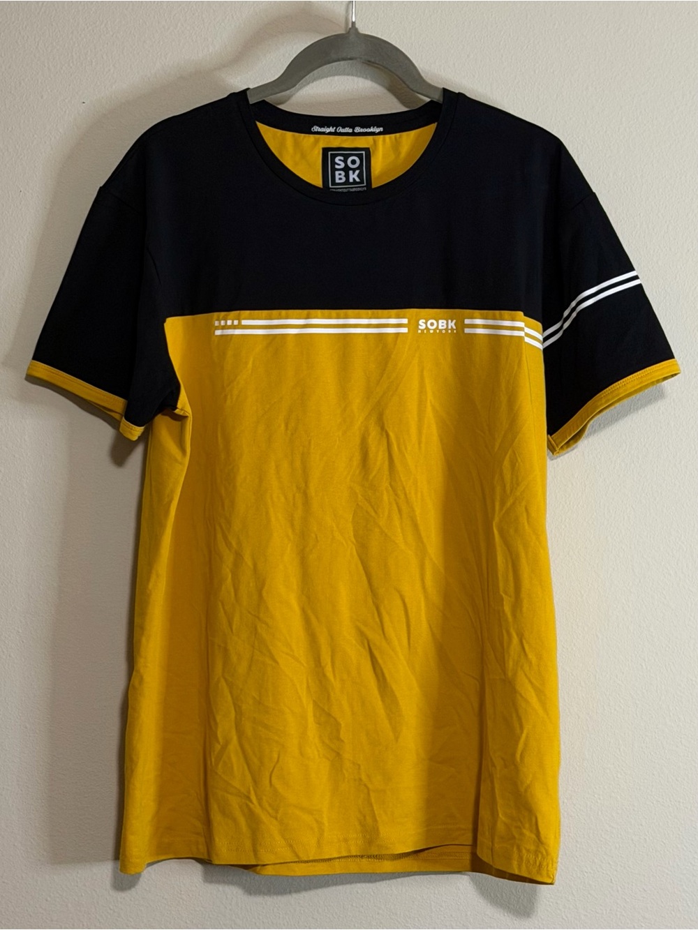 Supreme Black and Mustard Colorblock Short Sleeve Tee with Stripe Detail